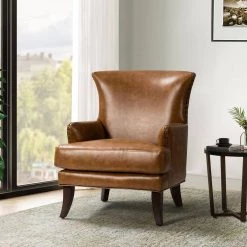 Bonnot Camel Solid and Manufactured Wooden Upholstered Faux Leather Armchair with Nailhead Trim by JAYDEN CREATION -JAYDEN CREATION Sales camel jayden creation accent chairs chlj0302 camel 31 1000